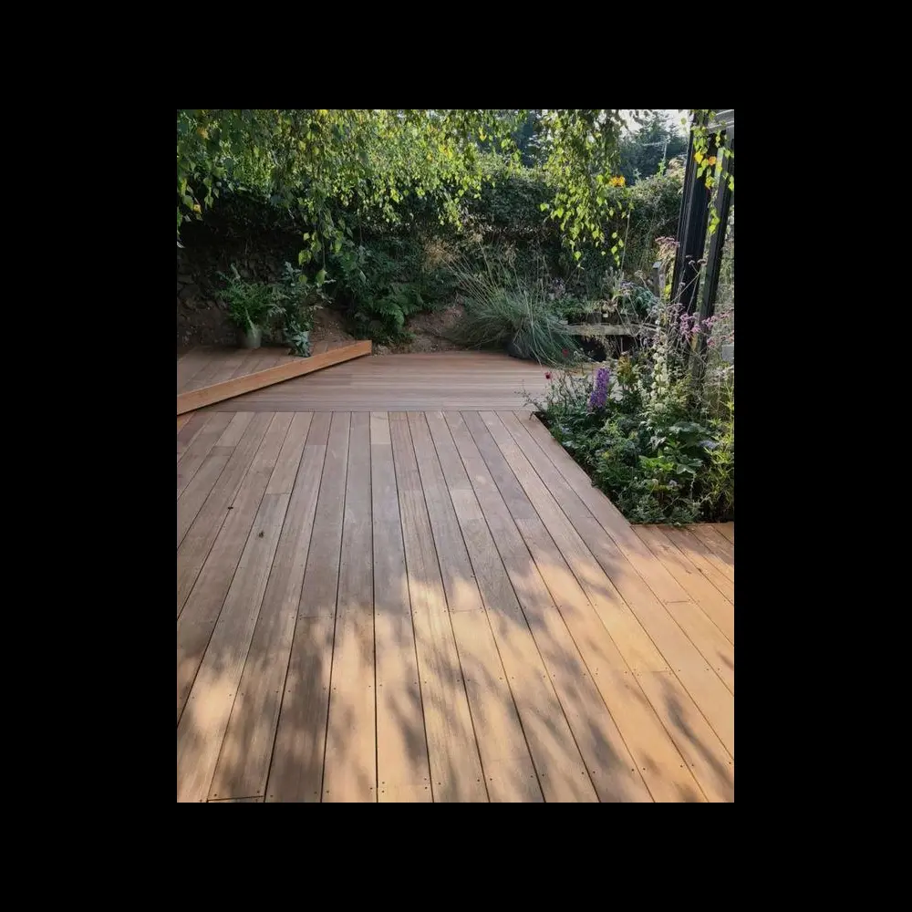 Timber deck installation in residential backyard